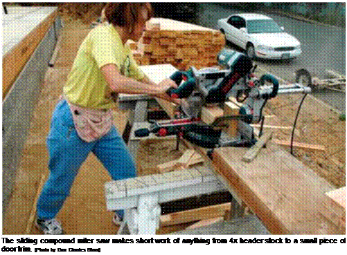 Подпись: The sliding compound miter saw makes short work of anything from 4x header stock to a small piece of door trim. [Photo by Don Charles Blom] 