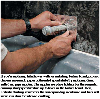 Подпись: If you're replacing tub/shower walls or installing backer board, protect chrome gooseneck pipes or threaded spout stubs by replacing them with 6-in. pipe nipples. The nipples are place-holders for the originals, ensuring that pipe stubs line up to holes in the backer board. Here, Foilastic flashing reinforces the waterproofing membrane and later will serve as a dam for silicone caulking. 