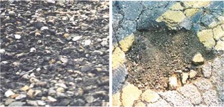 Water-Induced Damage in Asphaltic Wearing Surfaces