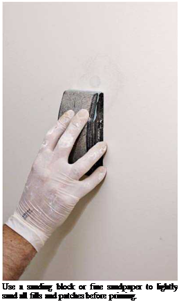 Подпись: Use a sanding block or fine sandpaper to lightly sand all fills and patches before priming. 