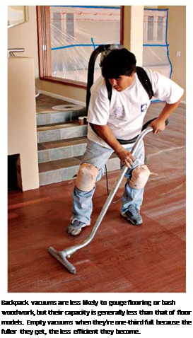 Подпись: Backpack vacuums are less likely to gouge flooring or bash woodwork, but their capacity is generally less than that of floor models. Empty vacuums when they're one-third full because the fuller they get, the less efficient they become. 