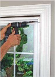 . Install the New Window with Expanders, Shims, and Screws